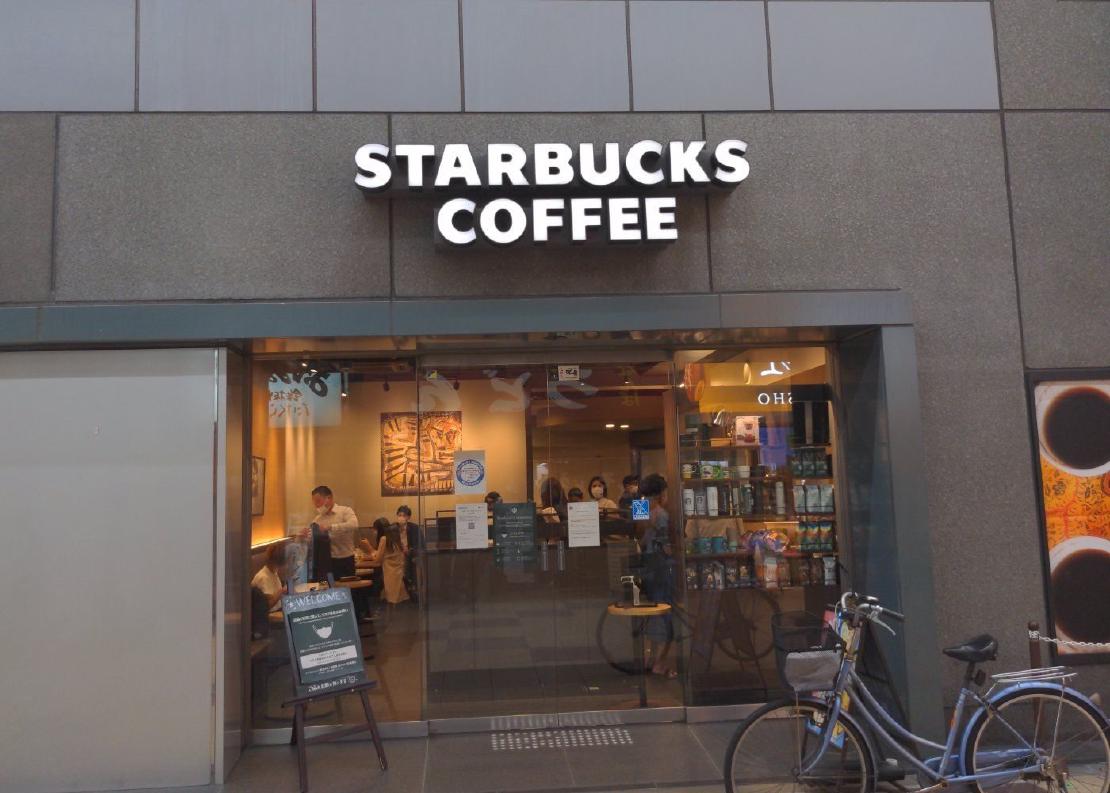 The exterior of a Starbucks storefront.