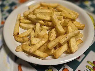 A plate of French fries.