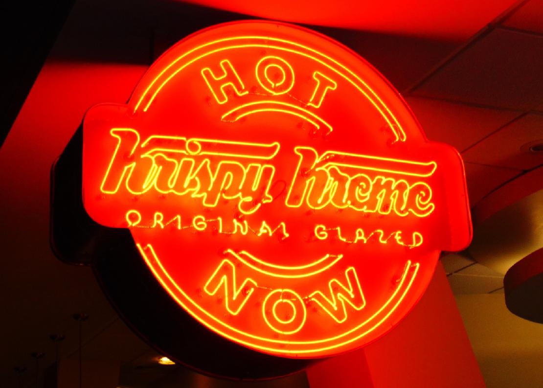 Krispy Kreme 'hot now' neon red sign at the Krispy Kreme in Mohegan Sun, Uncasville, Connecticut.